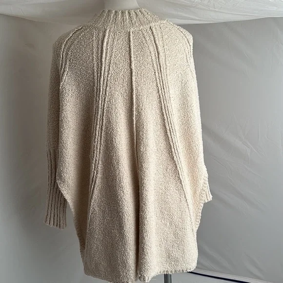 Free People Spin Around Poncho Top in an off-white cream color - Picture 5 of 10